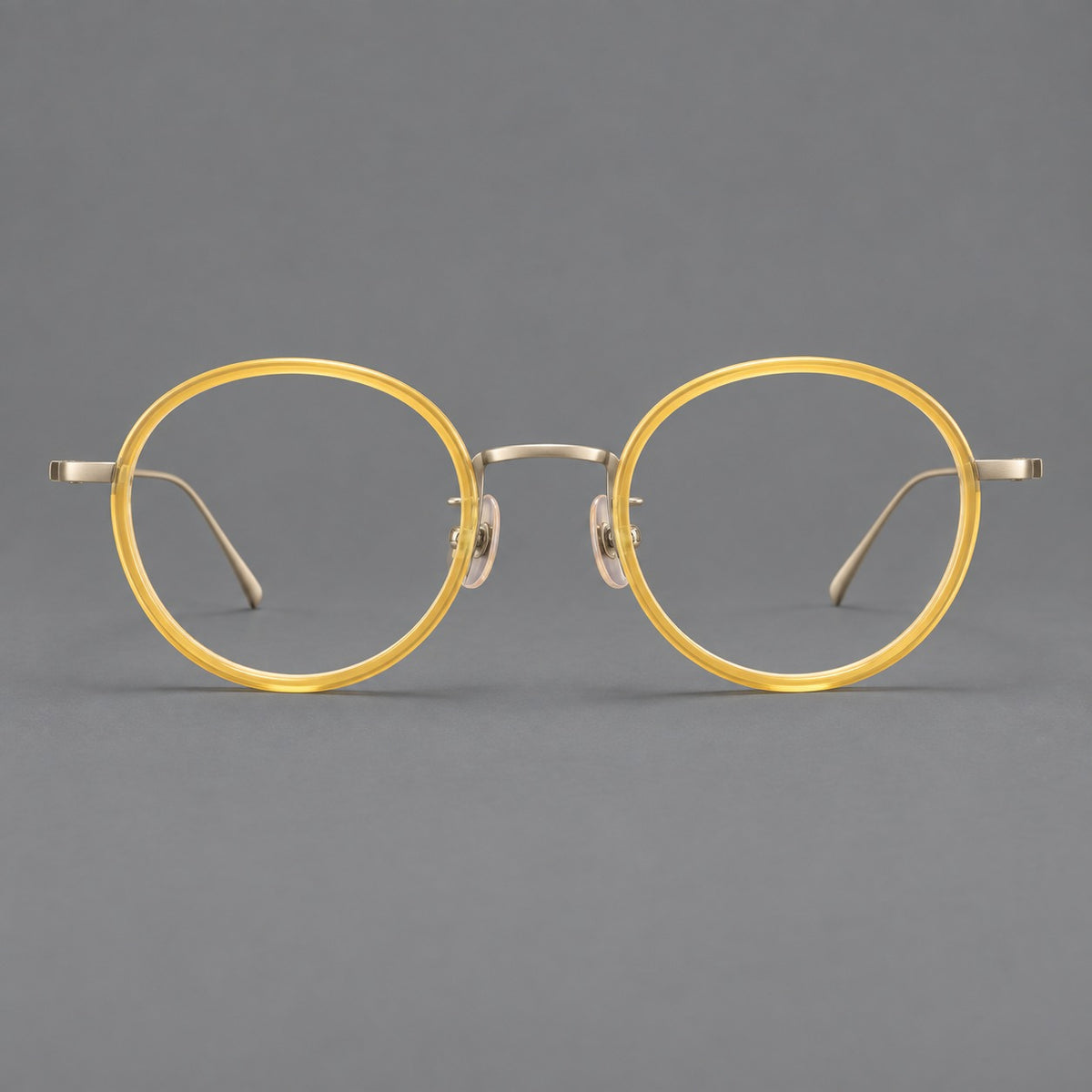 Classic round eyeglasses in acetate and titanium with slim rims and textured metal temples — Lemon Yellow / Gold — Front view [CINILY-JD2026-61005-C5]
