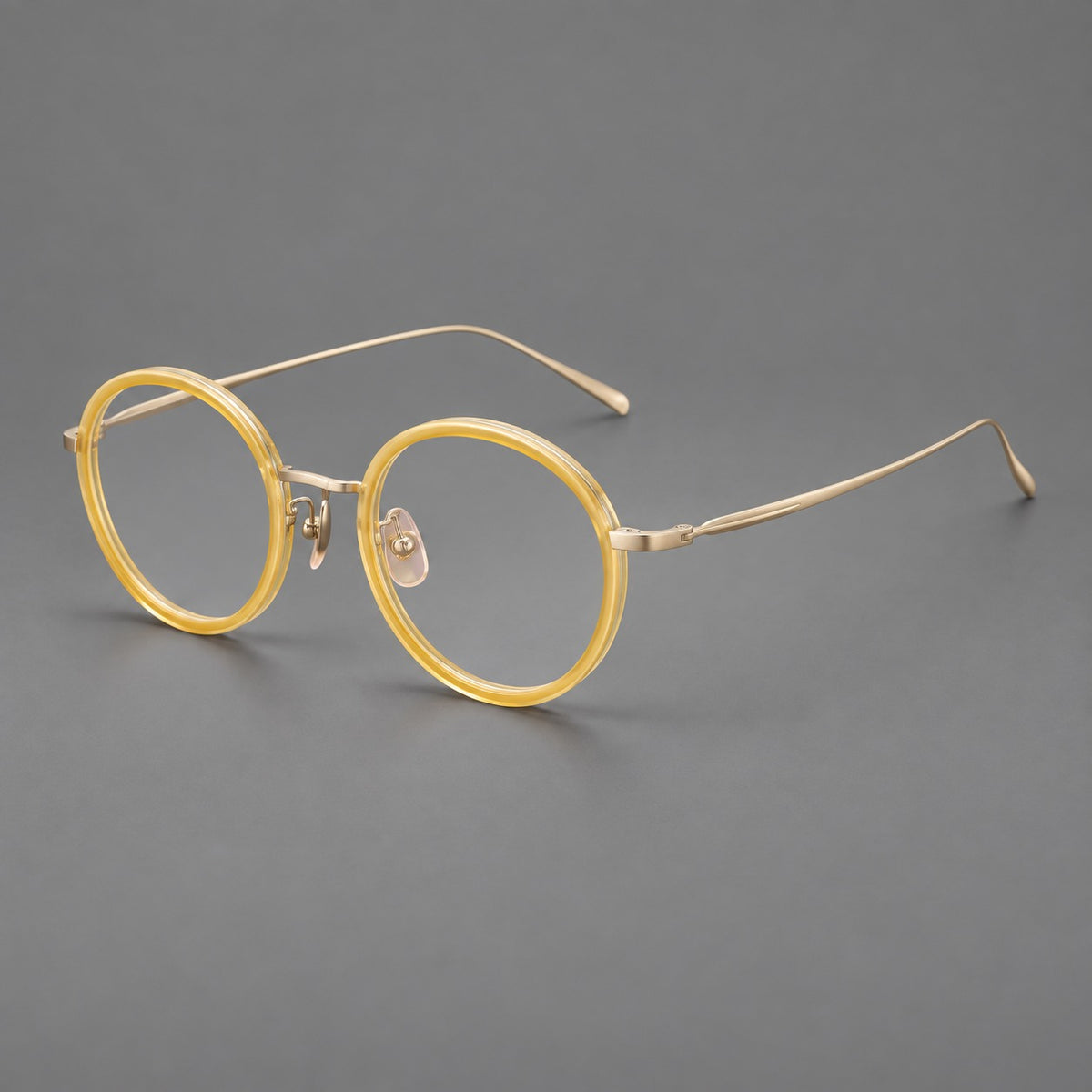 Classic round eyeglasses in acetate and titanium with slim rims and textured metal temples — Lemon Yellow / Gold — Main view [CINILY-JD2026-61005-C5]