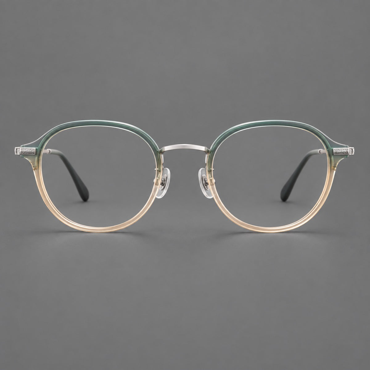 Softly rounded eyeglasses in acetate and titanium with a curved bridge and engraved temples — Green Tea Gradient / Silver — Front view [CINILY-JD2026-61007-C6]