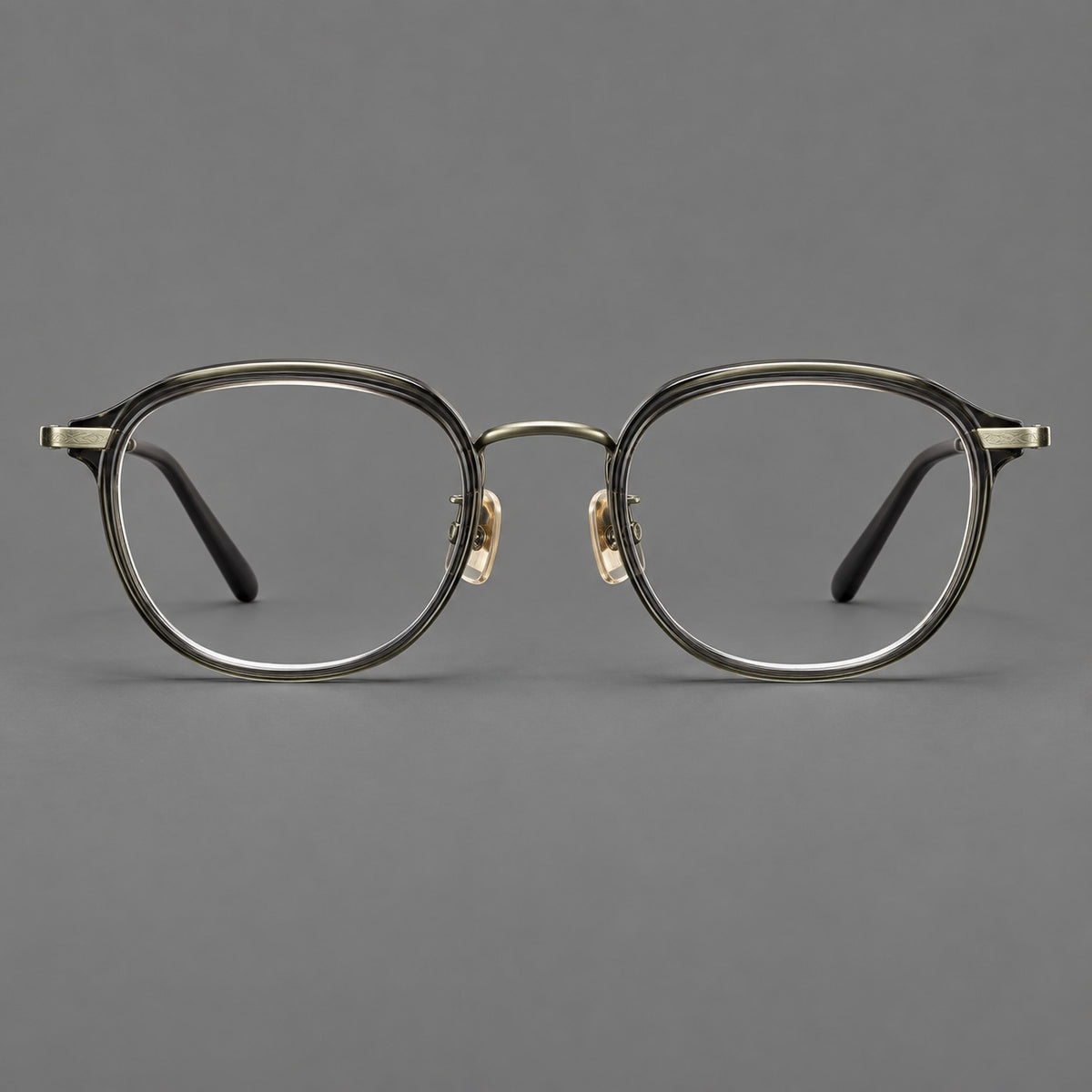 Soft square eyeglasses in acetate and titanium with rounded corners and decorative metal temples — Ice Grey Tortoiseshell / Antique Gold — Front view [CINILY-JD2026-61008-C1]