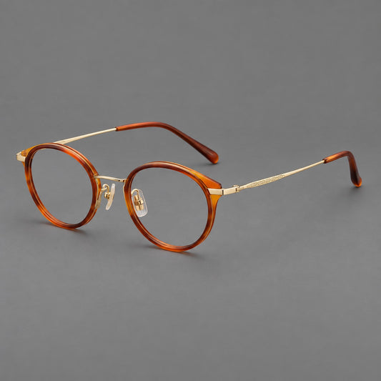 Retro panto eyeglasses in acetate and titanium with an arched bridge and engraved metal temples — Amber Tortoiseshell / Light Gold — Main view [CINILY-JD2026-61009-C1]