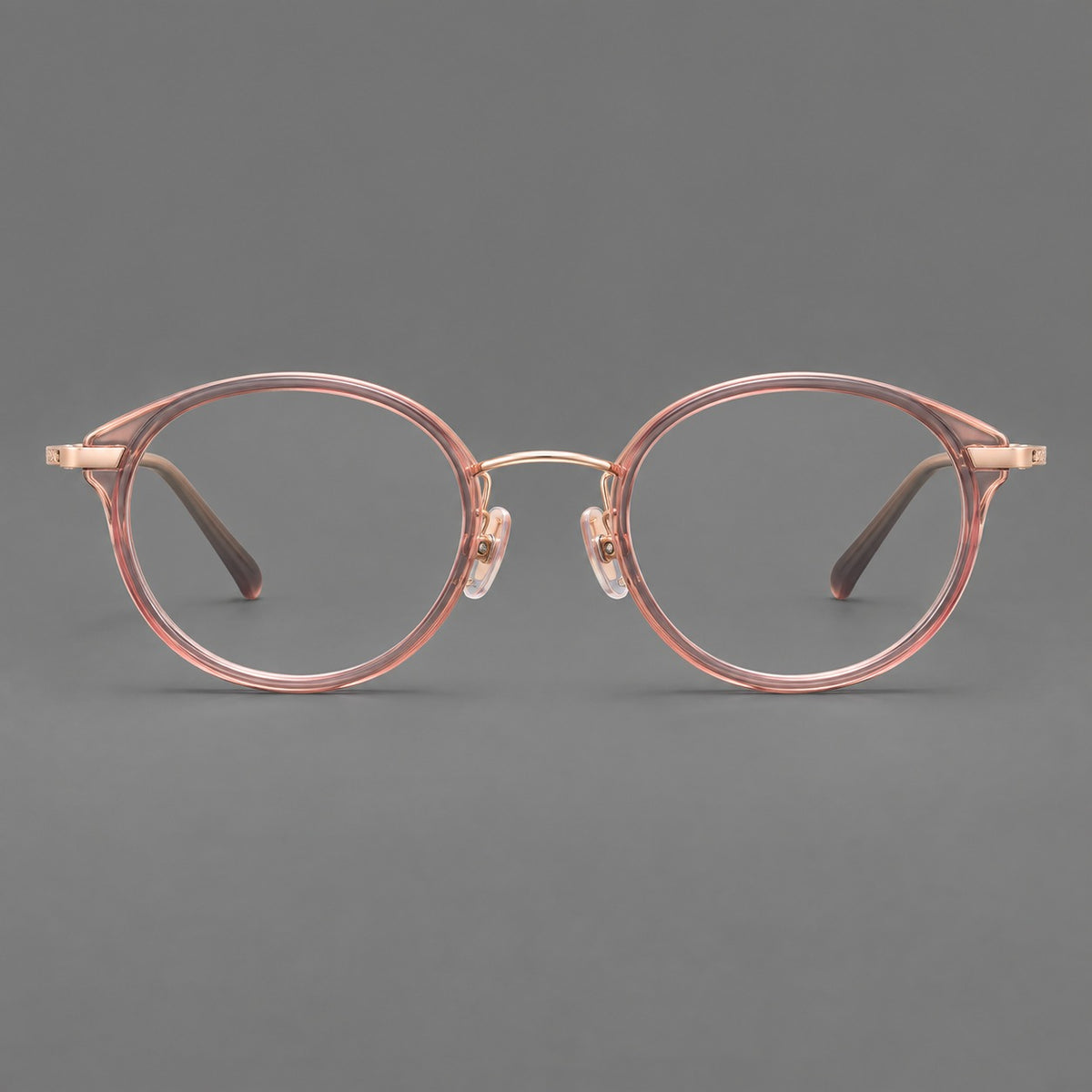 Retro panto eyeglasses in acetate and titanium with an arched bridge and engraved metal temples — Patterned Pink / Rose Gold — Front view [CINILY-JD2026-61009-C2]