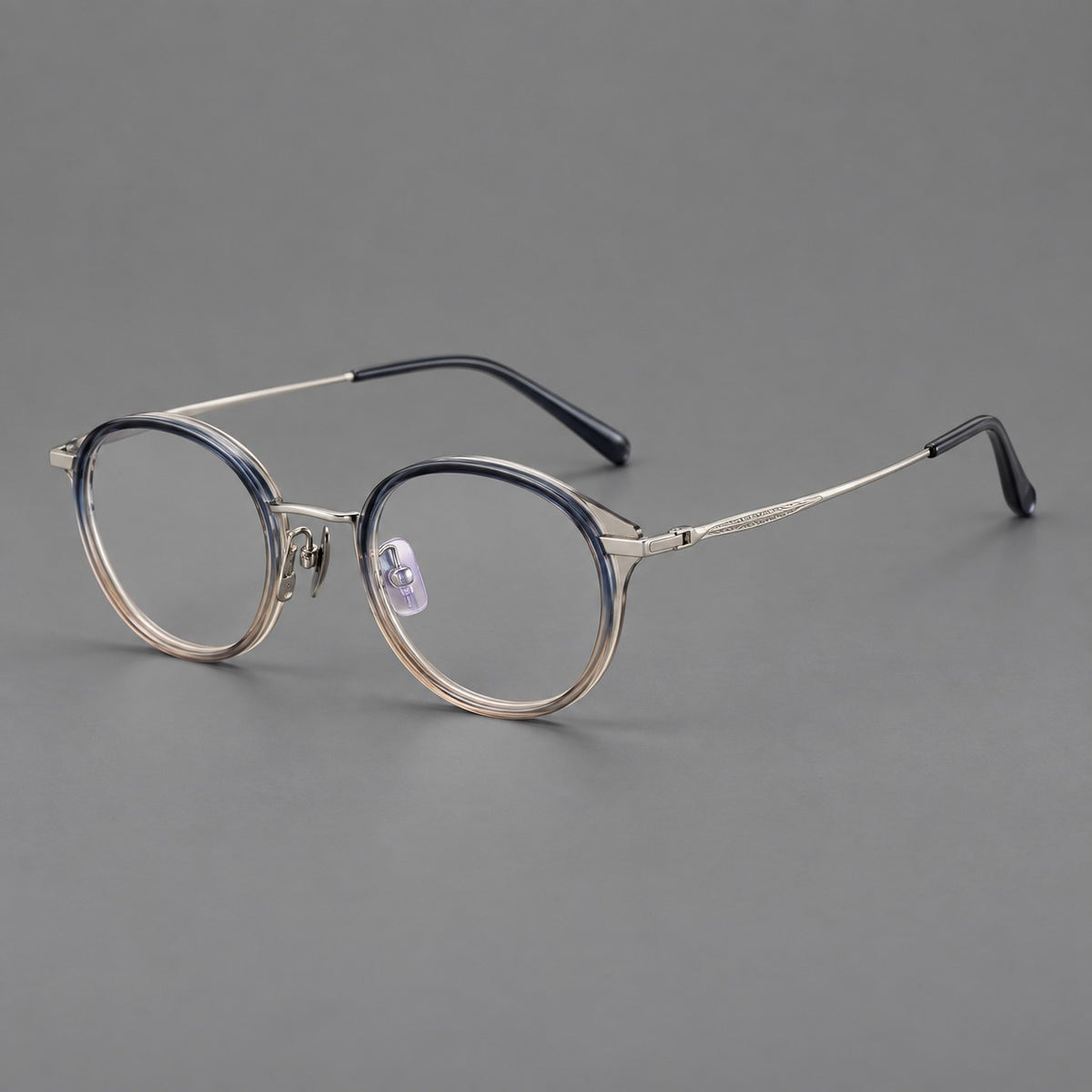 Retro panto eyeglasses in acetate and titanium with an arched bridge and engraved metal temples — Grey Blue Tea Gradient / Light Gunmetal — Main view [CINILY-JD2026-61009-C5]