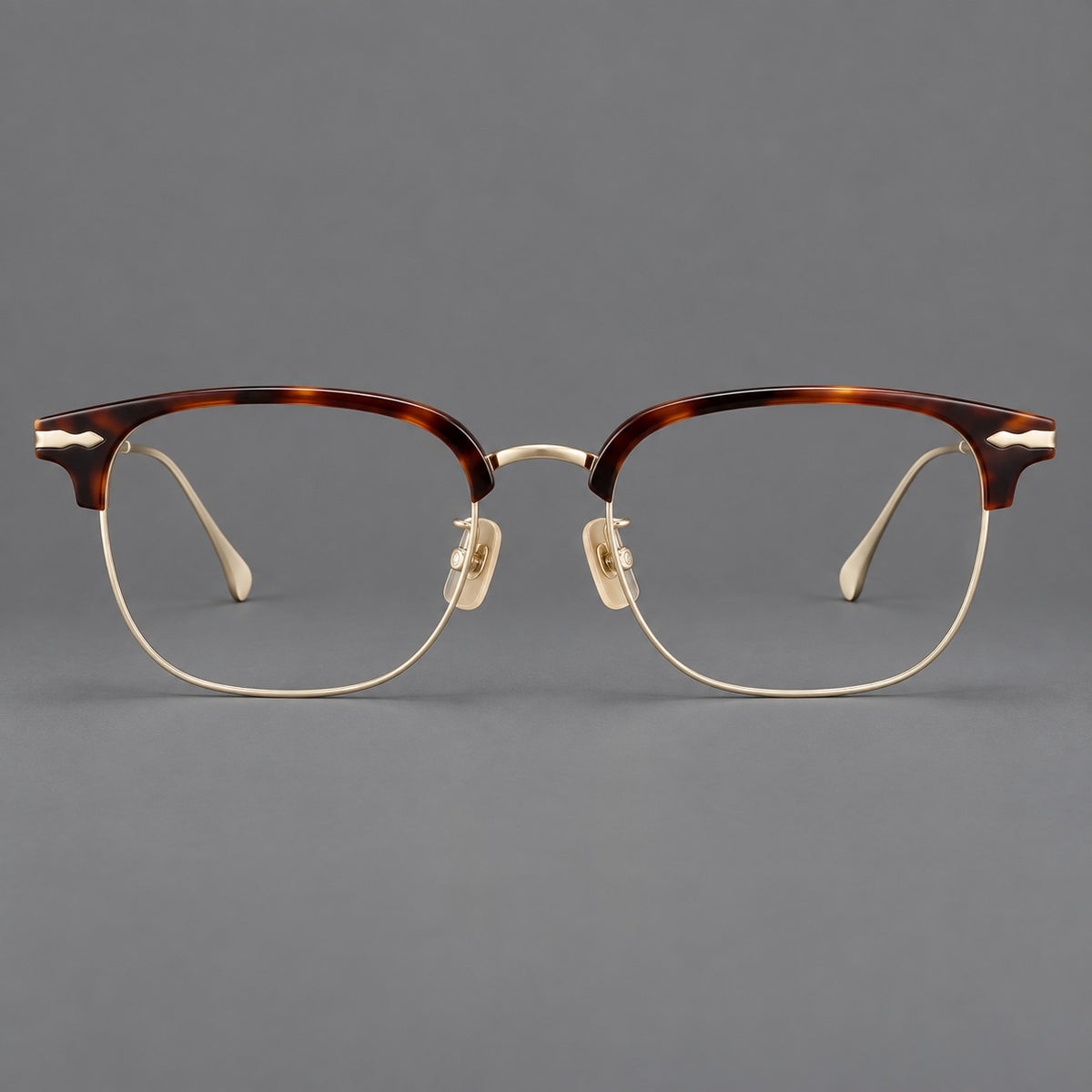 Browline eyeglasses in acetate and titanium with slim metal lower rims and decorative corners — Tortoiseshell / Gold — Front view [CINILY-JD2026-61012-C1]