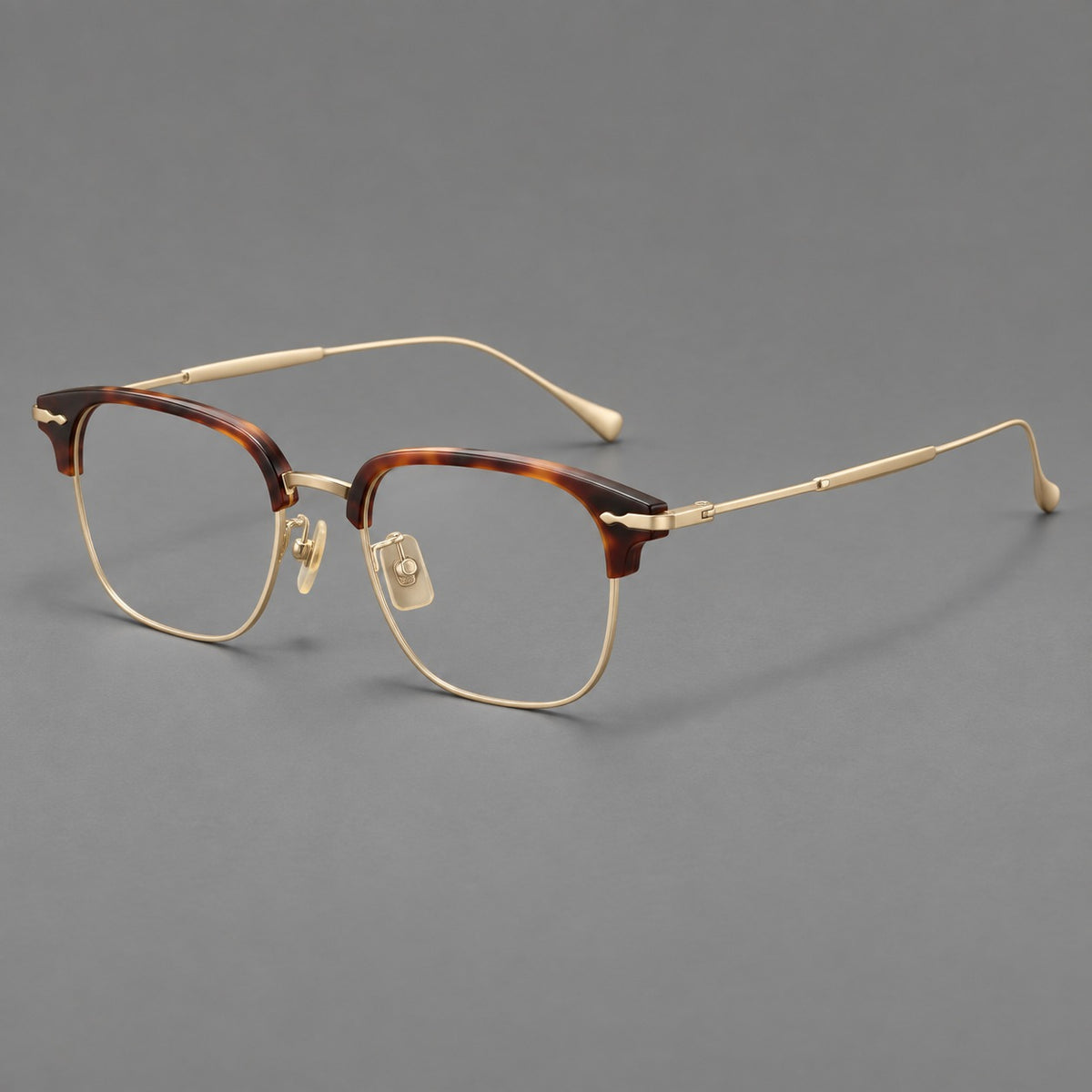 Browline eyeglasses in acetate and titanium with slim metal lower rims and decorative corners — Tortoiseshell / Gold — Main view [CINILY-JD2026-61012-C1]