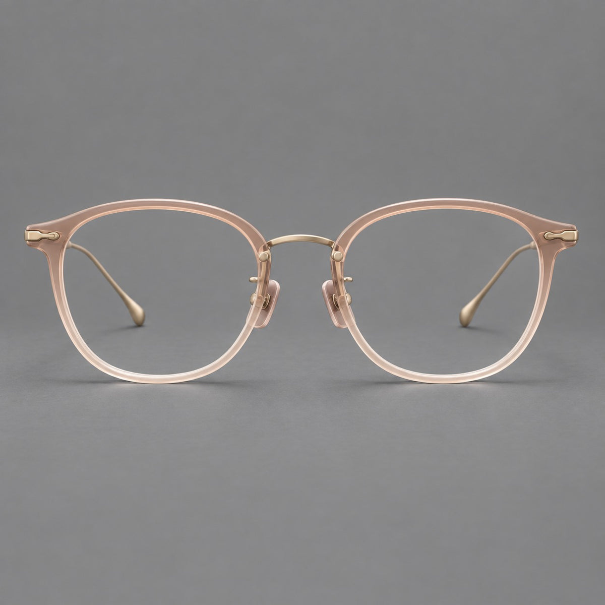 Panto eyeglasses in acetate and titanium with curved brows and decorative metal corner accents — Nude Pink / Gold — Front view [CINILY-JD2026-61014-C1]