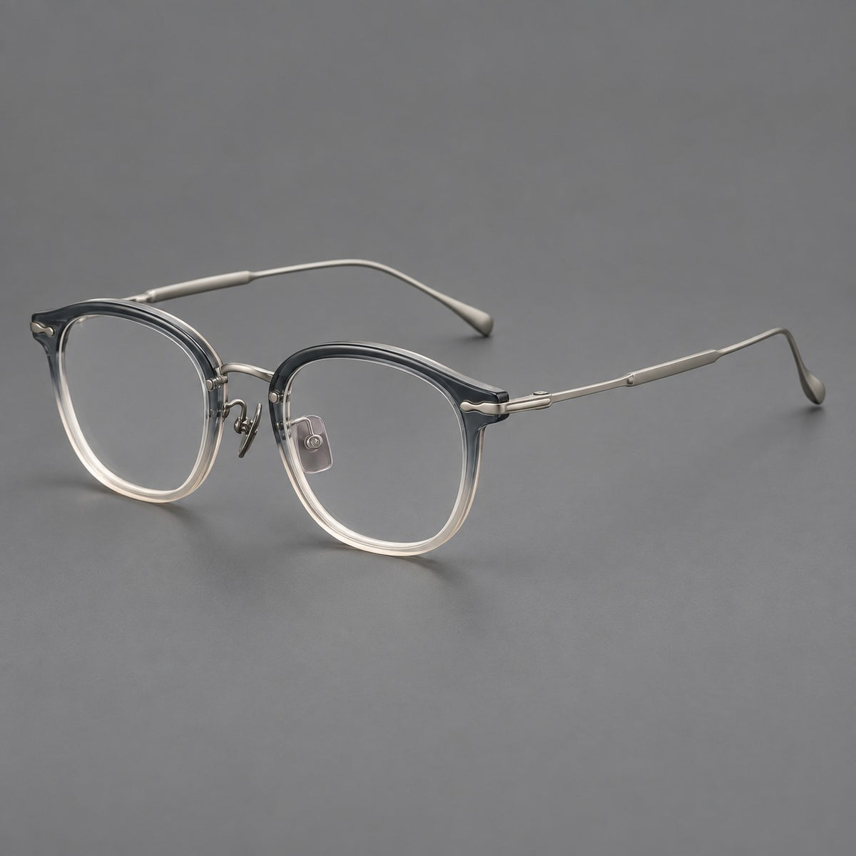 Panto eyeglasses in acetate and titanium with curved brows and decorative metal corner accents — Ice Blue Tea / Silver — Main view [CINILY-JD2026-61014-C5]