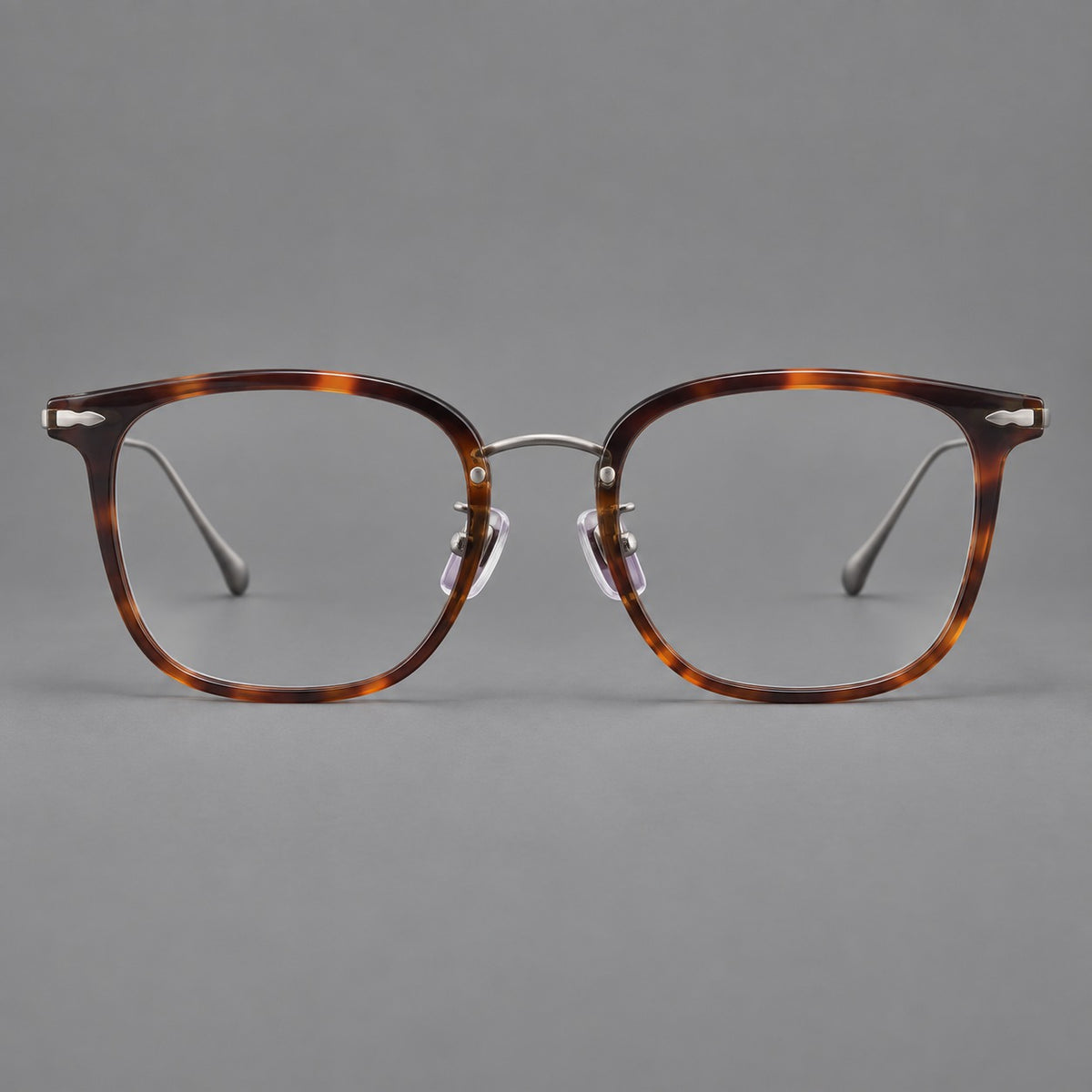 Retro square eyeglasses in acetate and titanium with rounded edges and sculpted corner accents — Tortoiseshell / Antique Copper — Front view [CINILY-JD2026-61015-C1]