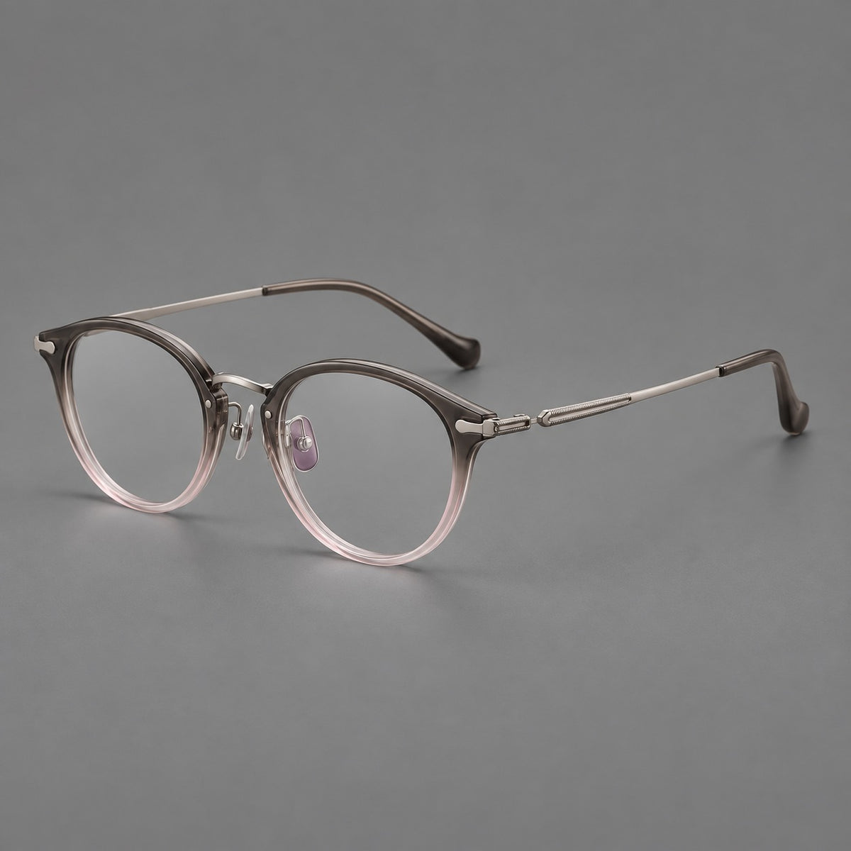 Vintage panto eyeglasses in acetate and titanium with raised brows and textured metal temples — Mist Pink Gradient / Gunmetal — Main view [CINILY-JD2026-61017-C6]