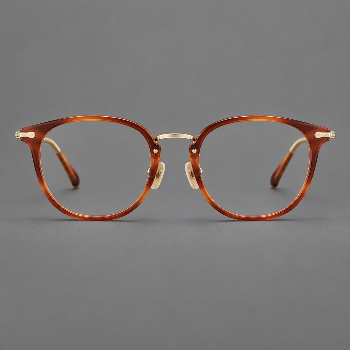 Classic soft square eyeglasses in acetate and titanium with engraved temples and corner accents — Amber Tortoiseshell / Gold — Front view [CINILY-JD2026-61018-C1]
