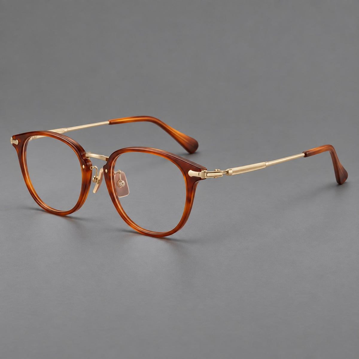 Classic soft square eyeglasses in acetate and titanium with engraved temples and corner accents — Amber Tortoiseshell / Gold — Main view [CINILY-JD2026-61018-C1]