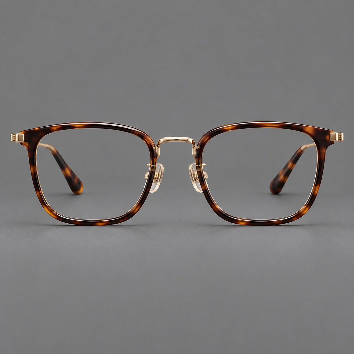 Soft square eyeglasses in acetate and titanium with wide upper corners and fine metal temples — Tortoiseshell / Gold — Front view [CINILY-JD2026-61021-C1]