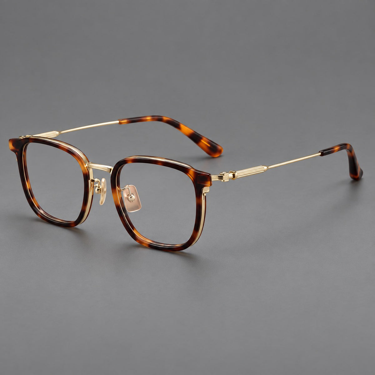 Soft square eyeglasses in acetate and titanium with wide upper corners and fine metal temples — Tortoiseshell / Gold — Main view [CINILY-JD2026-61021-C1]