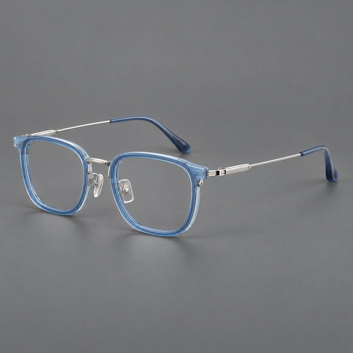Soft square eyeglasses in acetate and titanium with wide upper corners and fine metal temples — Clear Blue / Silver — Main view [CINILY-JD2026-61021-C5]