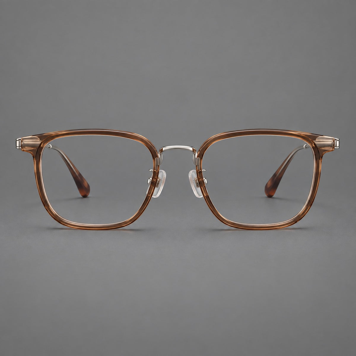 Soft square eyeglasses in acetate and titanium with wide upper corners and fine metal temples — Clear Tea / Silver — Front view [CINILY-JD2026-61021-C6]