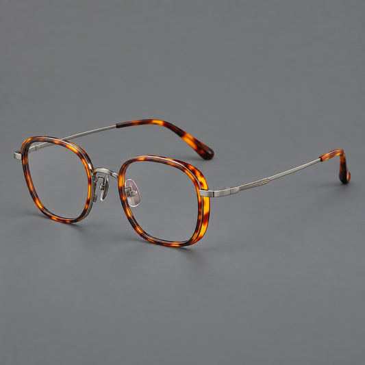 Rounded square eyeglasses in acetate and titanium with an arched bridge and engraved temples — Amber Tortoiseshell / Gunmetal — Main view [CINILY-JD2026-61023-C1]