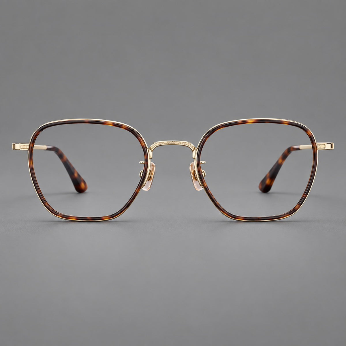 Soft square eyeglasses in acetate and titanium with slim rims and a finely engraved metal bridge — Tortoiseshell / Gold — Front view [CINILY-JD2026-61026-C1]