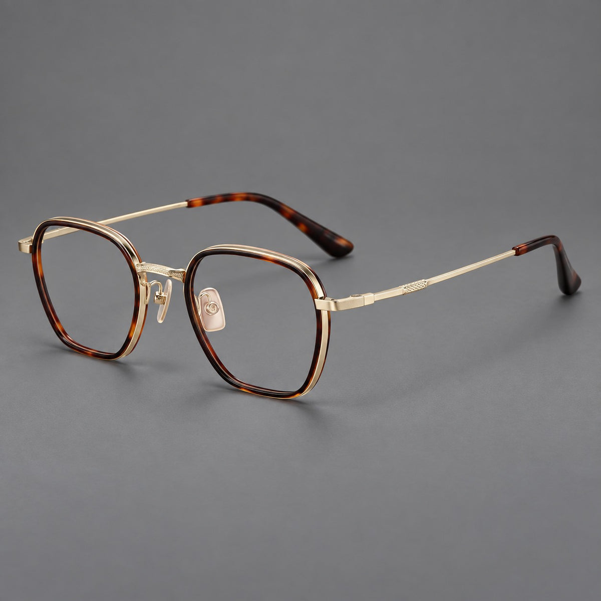 Soft square eyeglasses in acetate and titanium with slim rims and a finely engraved metal bridge — Tortoiseshell / Gold — Main view [CINILY-JD2026-61026-C1]
