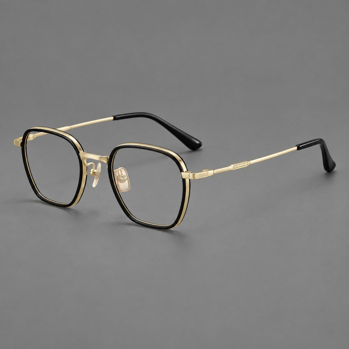 Soft square eyeglasses in acetate and titanium with slim rims and a finely engraved metal bridge — Glossy Black / Gold — Main view [CINILY-JD2026-61026-C3]