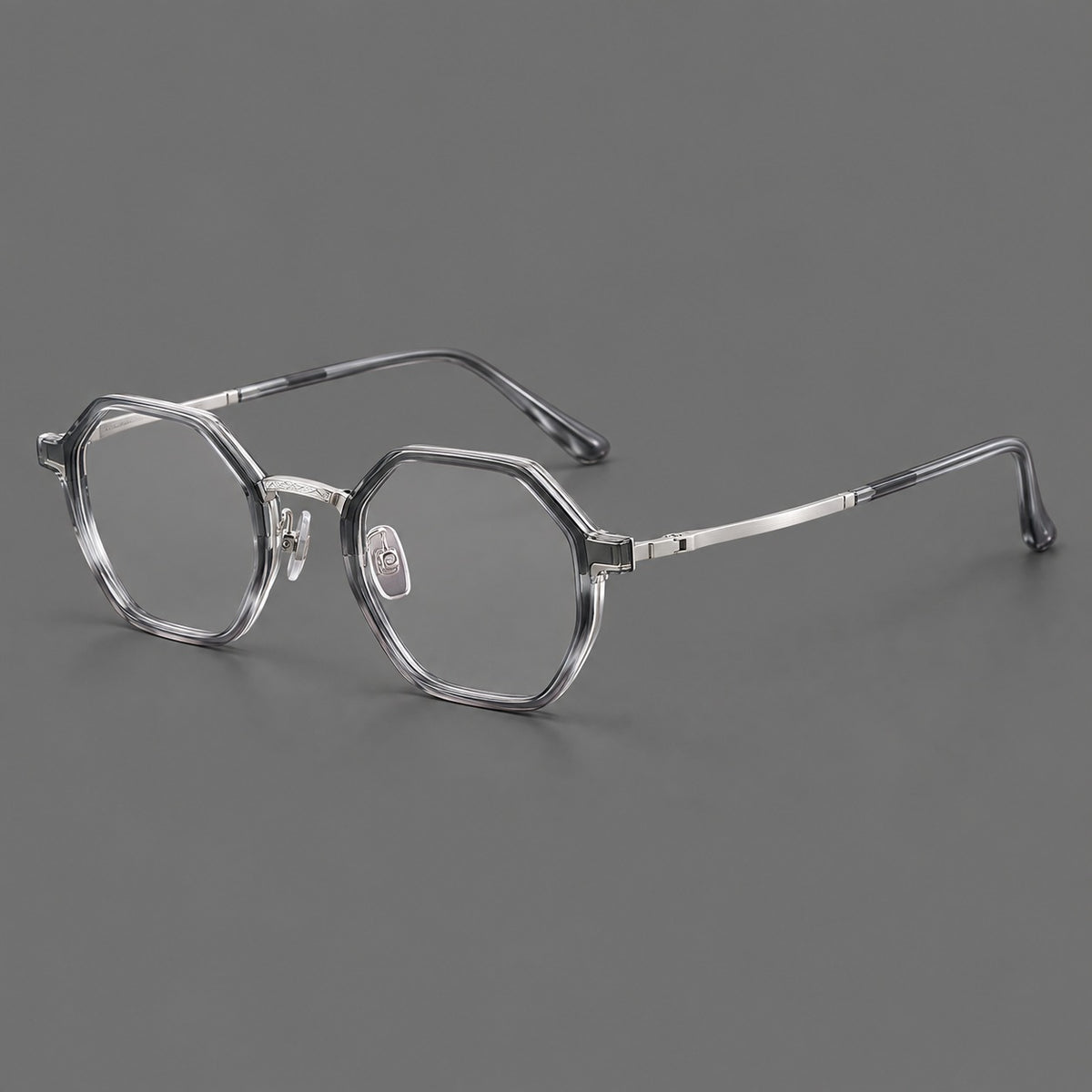 Geometric eyeglasses in acetate and titanium with octagonal rims and a textured metal bridge — Clear Mist Grey / Silver — Main view [CINILY-JD2026-61027-C2]