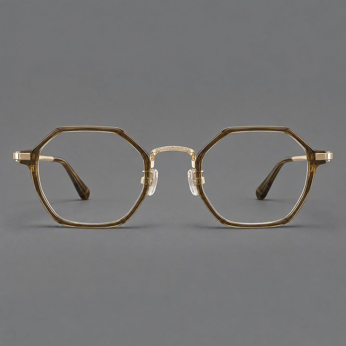 Geometric eyeglasses in acetate and titanium with octagonal rims and a textured metal bridge — Clear Tea Green / Light Gold — Front view [CINILY-JD2026-61027-C5]