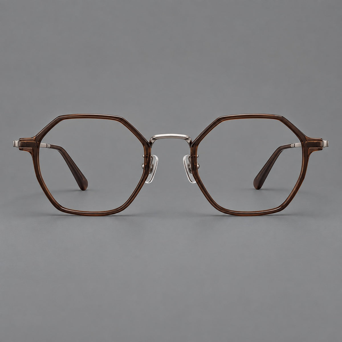 Geometric eyeglasses in acetate and titanium with octagonal rims and a textured metal bridge — Warm Tea Brown / Light Gunmetal — Front view [CINILY-JD2026-61027-C6]