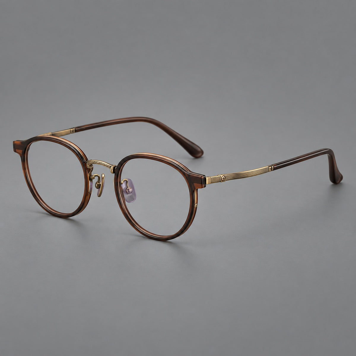 Round eyeglasses in acetate and titanium with widened outer corners and slender metal temples — Coffee Brown / Antique Bronze — Main view [CINILY-JD2026-61028-C5]