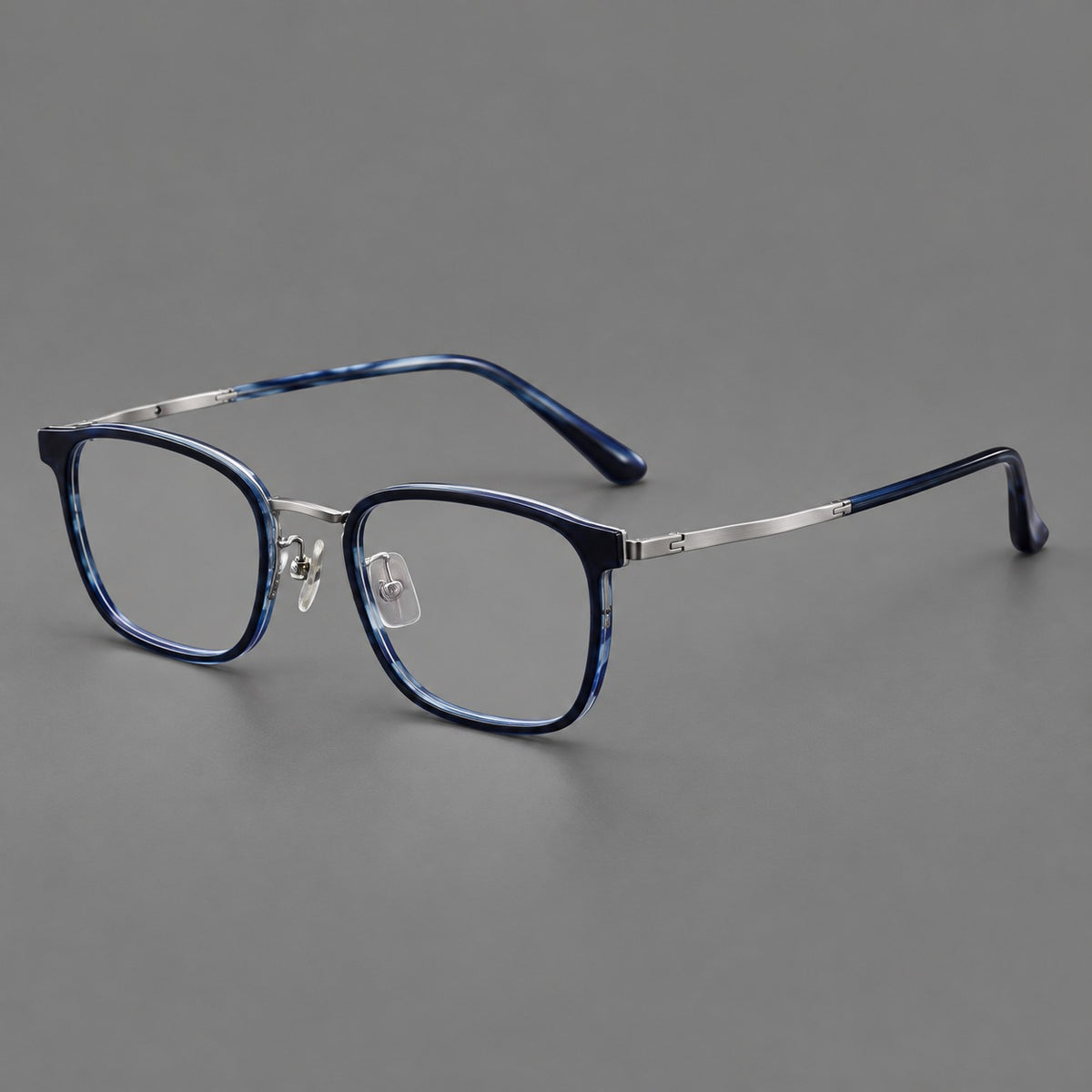 Rounded rectangular eyeglasses in acetate and titanium with bold corners and engraved metal temples — Blue / Gunmetal — Main view [CINILY-JD2026-61029-C2]