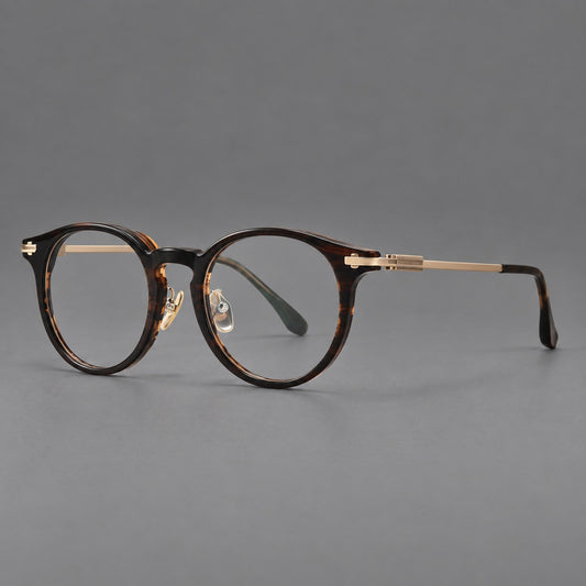 Retro acetate and titanium eyeglasses with round rims and a pronounced keyhole bridge — Brown Woodgrain / Gold — Main view [CINILY-JD2026-8006-C1]