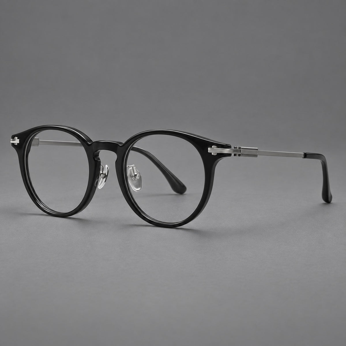 Retro acetate and titanium eyeglasses with round rims and a pronounced keyhole bridge — Black / Grey — Main view [CINILY-JD2026-8006-C2]