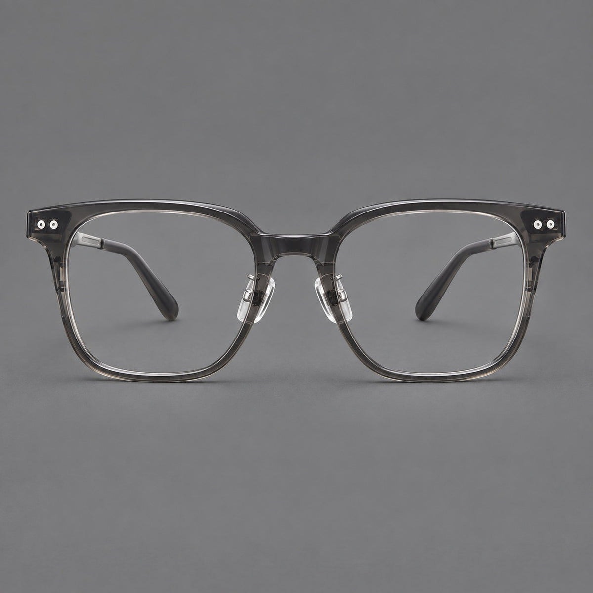 Classic acetate and titanium eyeglasses with squared brows and paired corner rivets — Clear Grey / Silver — Front view [CINILY-JD2026-8008-C4]
