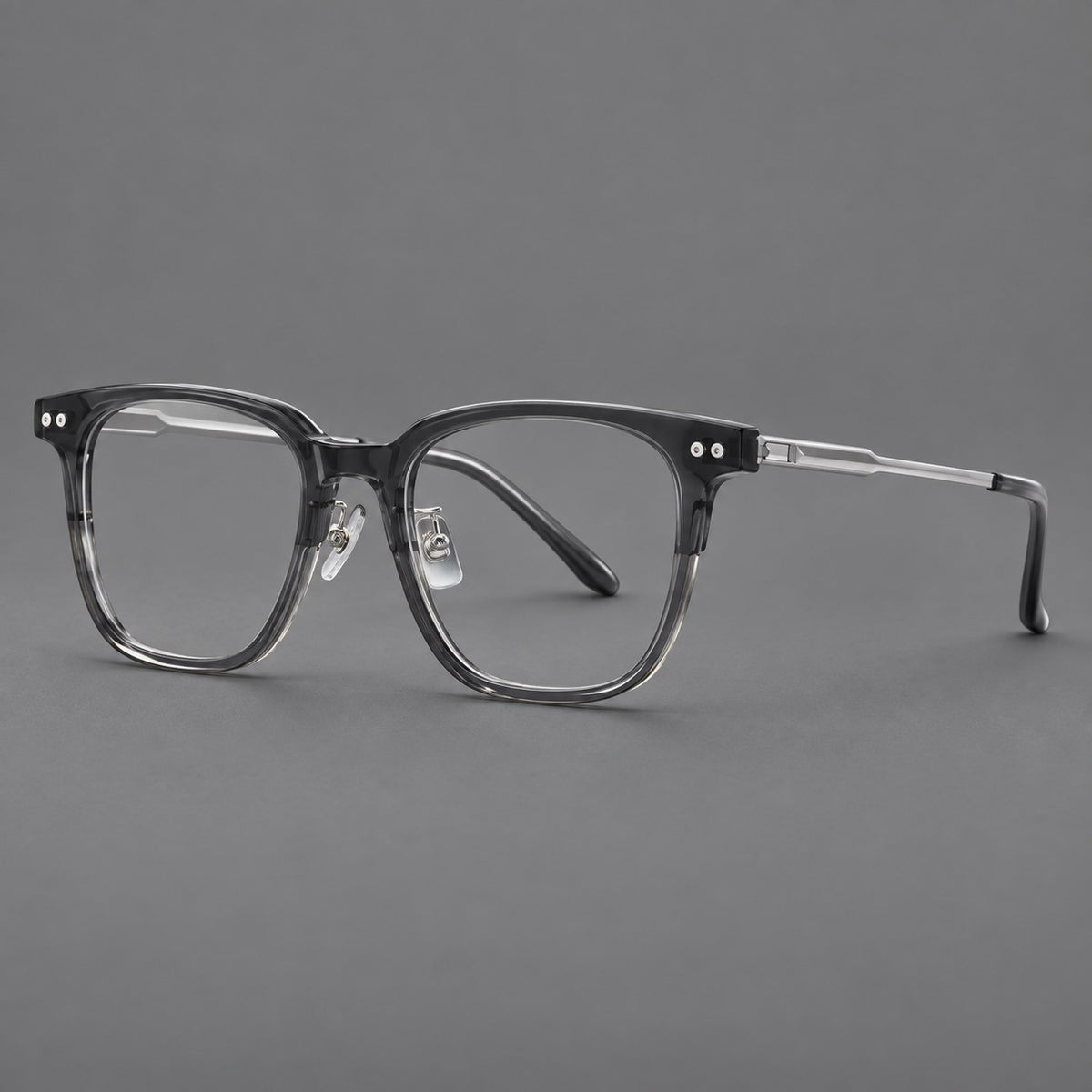 Classic acetate and titanium eyeglasses with squared brows and paired corner rivets — Clear Grey / Silver — Main view [CINILY-JD2026-8008-C4]
