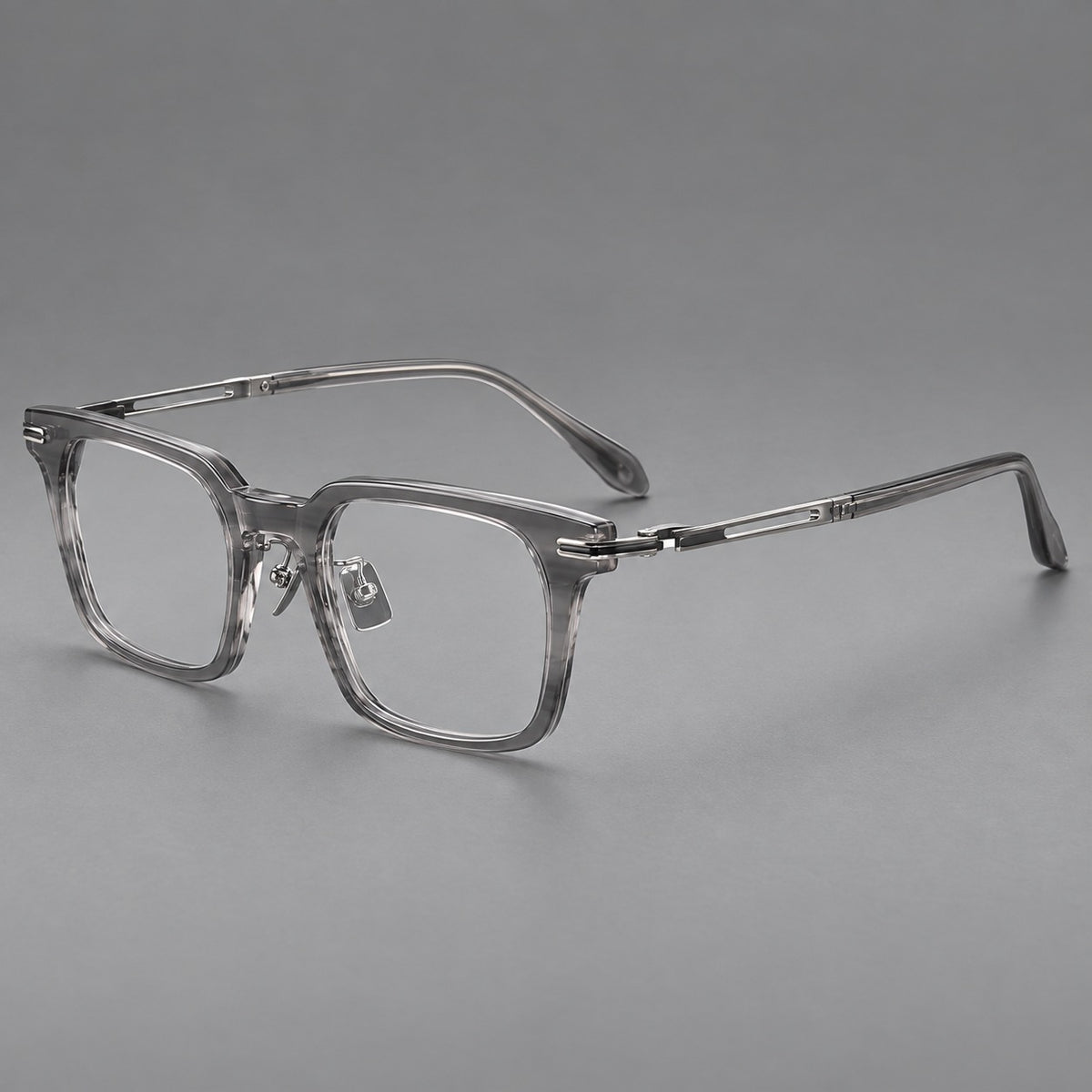 Modern acetate and titanium eyeglasses with angular square rims and curved metal hinges — Clear Grey — Main view [CINILY-JD2026-8010-C4]