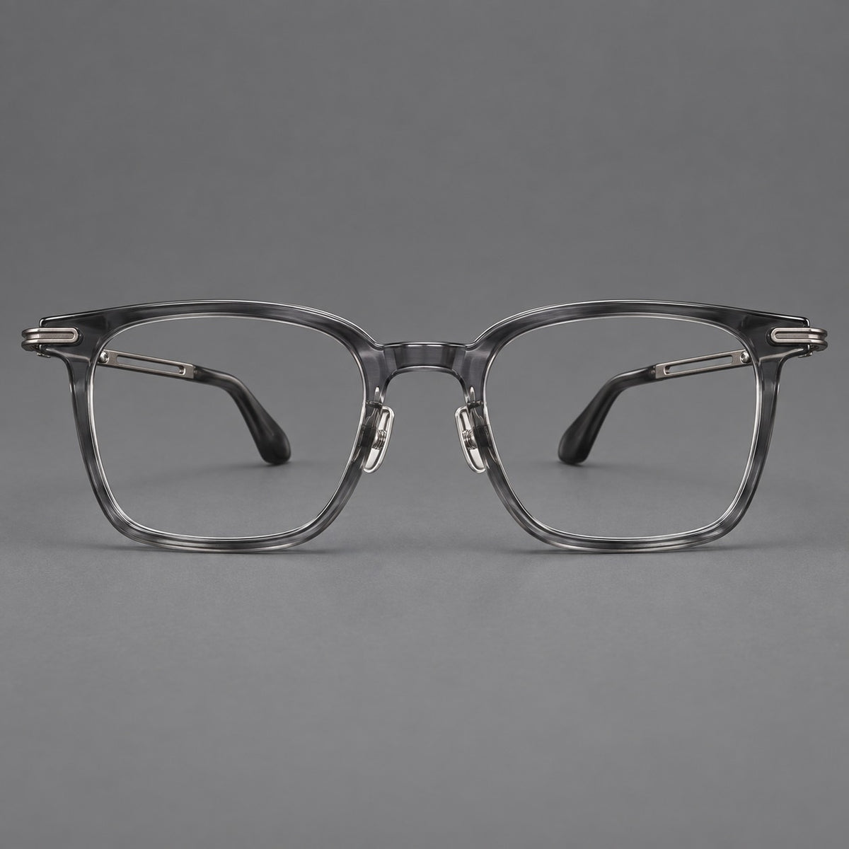 Acetate and titanium eyeglasses with rounded rectangular rims and sculpted open loop joints — Clear Grey / Brushed Grey — Front view [CINILY-JD2026-8012-C3]