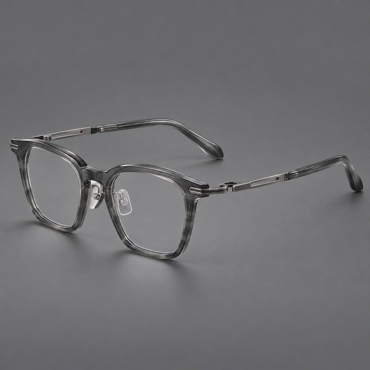Acetate and titanium eyeglasses with rounded rectangular rims and sculpted open loop joints — Clear Grey / Brushed Grey — Main view [CINILY-JD2026-8012-C3]