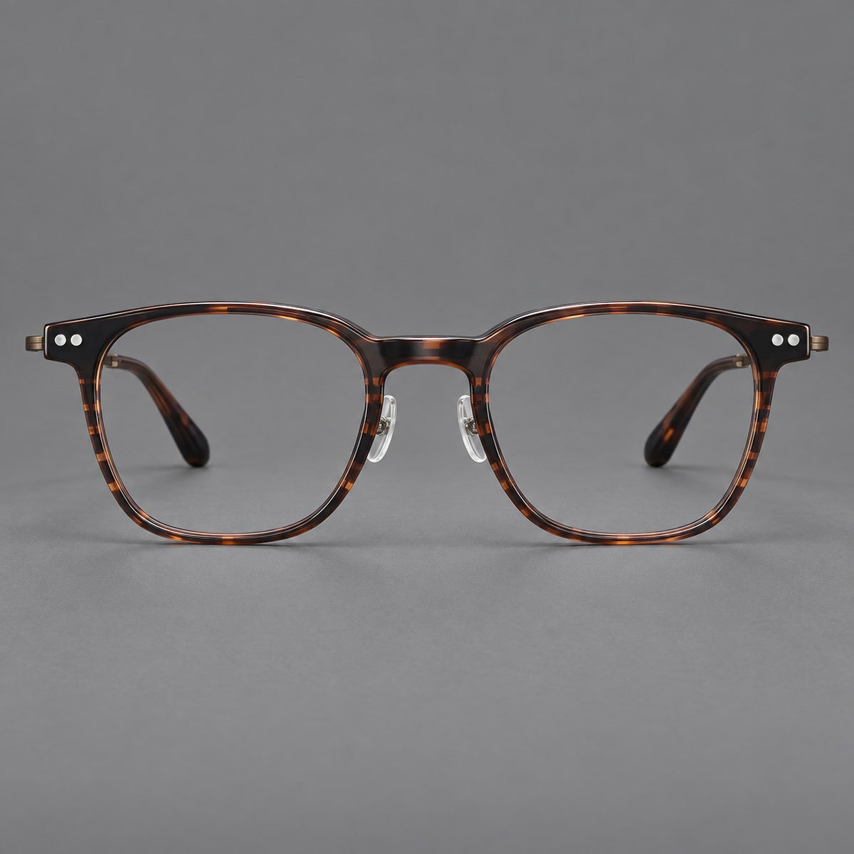 Vintage acetate and titanium eyeglasses with soft square rims and paired metal rivets — Striped Brown / Antique Bronze — Front view [CINILY-JD2026-8015-C1]