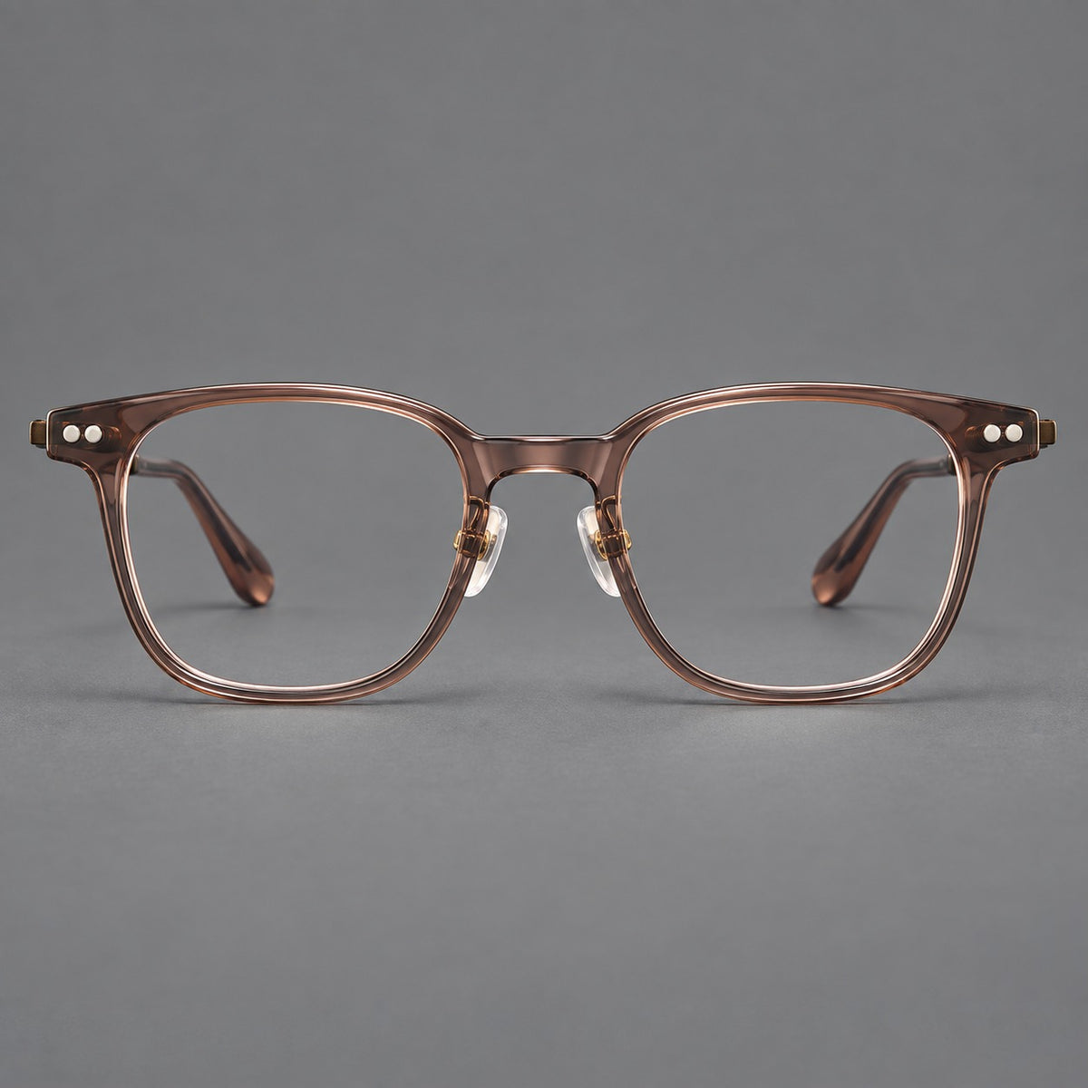 Vintage acetate and titanium eyeglasses with soft square rims and paired metal rivets — Clear Brown / Antique Bronze — Front view [CINILY-JD2026-8015-C4]