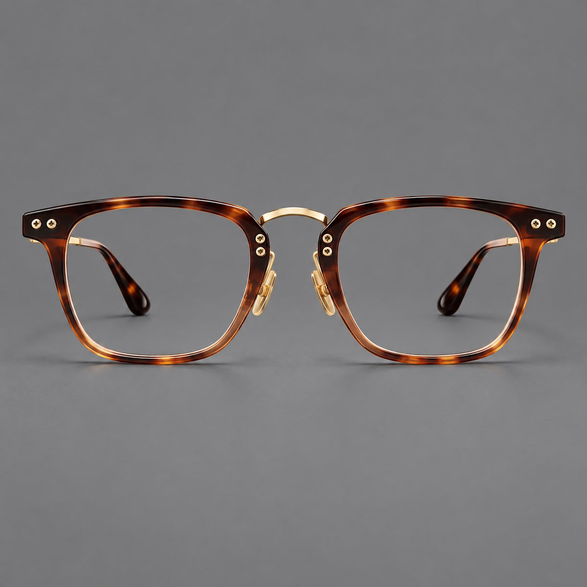 Acetate and titanium eyeglasses with soft square rims and an arched metal bridge — Tortoiseshell / Gold — Front view [CINILY-JD2026-8018-C1]
