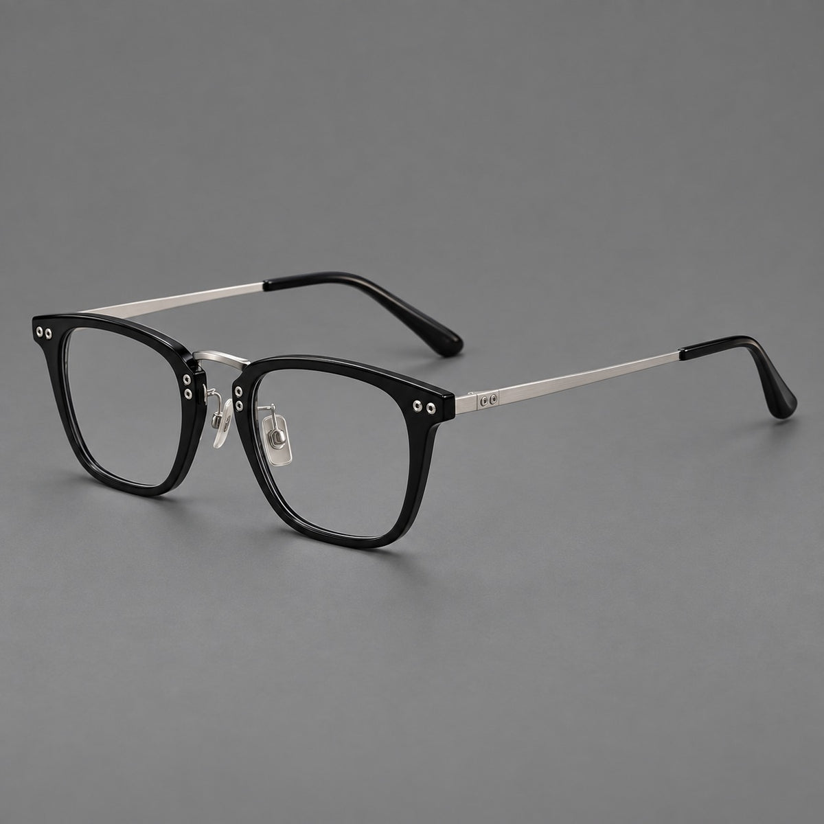Acetate and titanium eyeglasses with soft square rims and an arched metal bridge — Black / Silver — Main view [CINILY-JD2026-8018-C3]