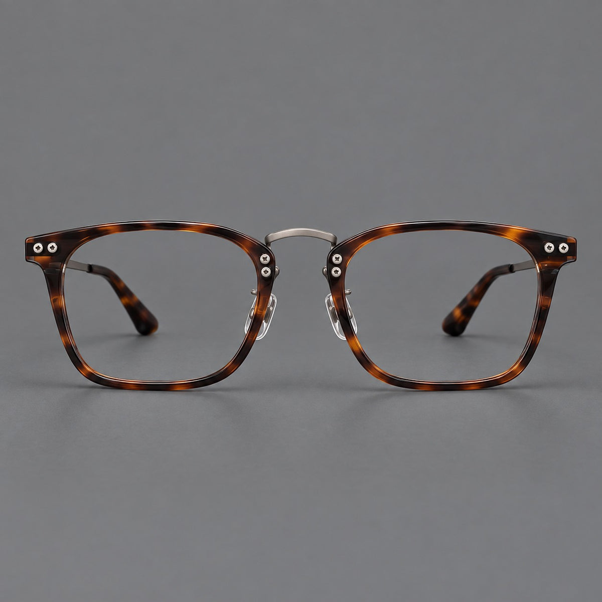 Acetate and titanium eyeglasses with angular rectangular rims and a curved metal bridge — Tortoiseshell / Gunmetal — Front view [CINILY-JD2026-8019-C1]
