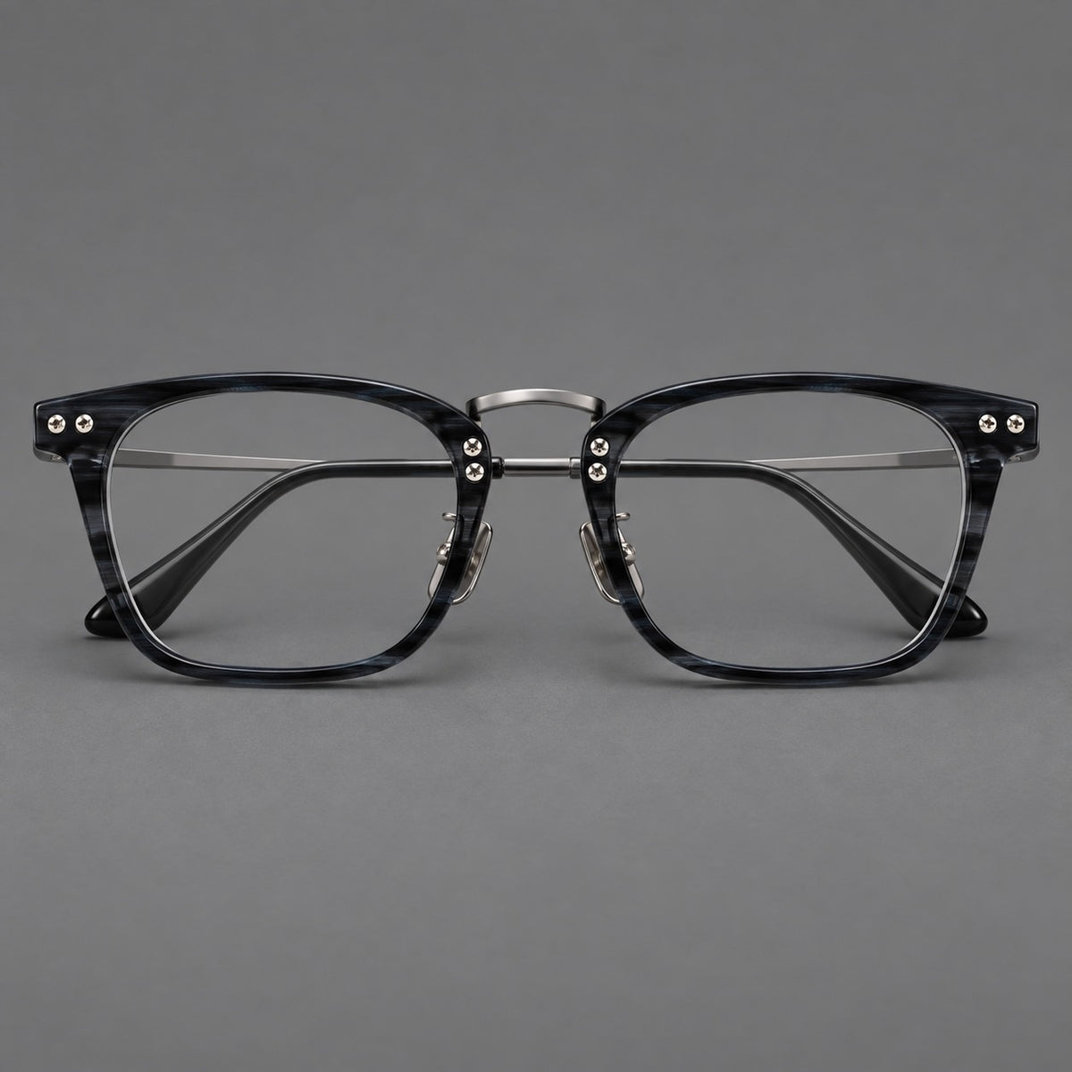 Acetate and titanium eyeglasses with angular rectangular rims and a curved metal bridge — Grey Blue Woodgrain / Gunmetal — Front view [CINILY-JD2026-8019-C2]