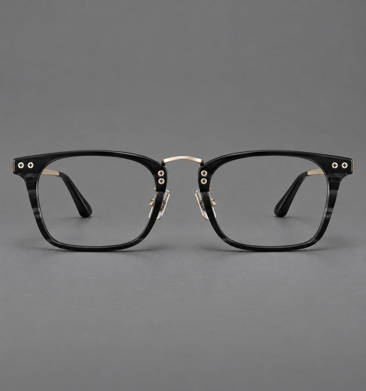 Acetate and titanium eyeglasses with angular rectangular rims and a curved metal bridge — Black / Gold — Front view [CINILY-JD2026-8019-C3]