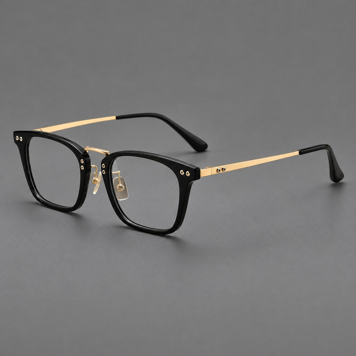 Acetate and titanium eyeglasses with angular rectangular rims and a curved metal bridge — Black / Gold — Main view [CINILY-JD2026-8019-C3]