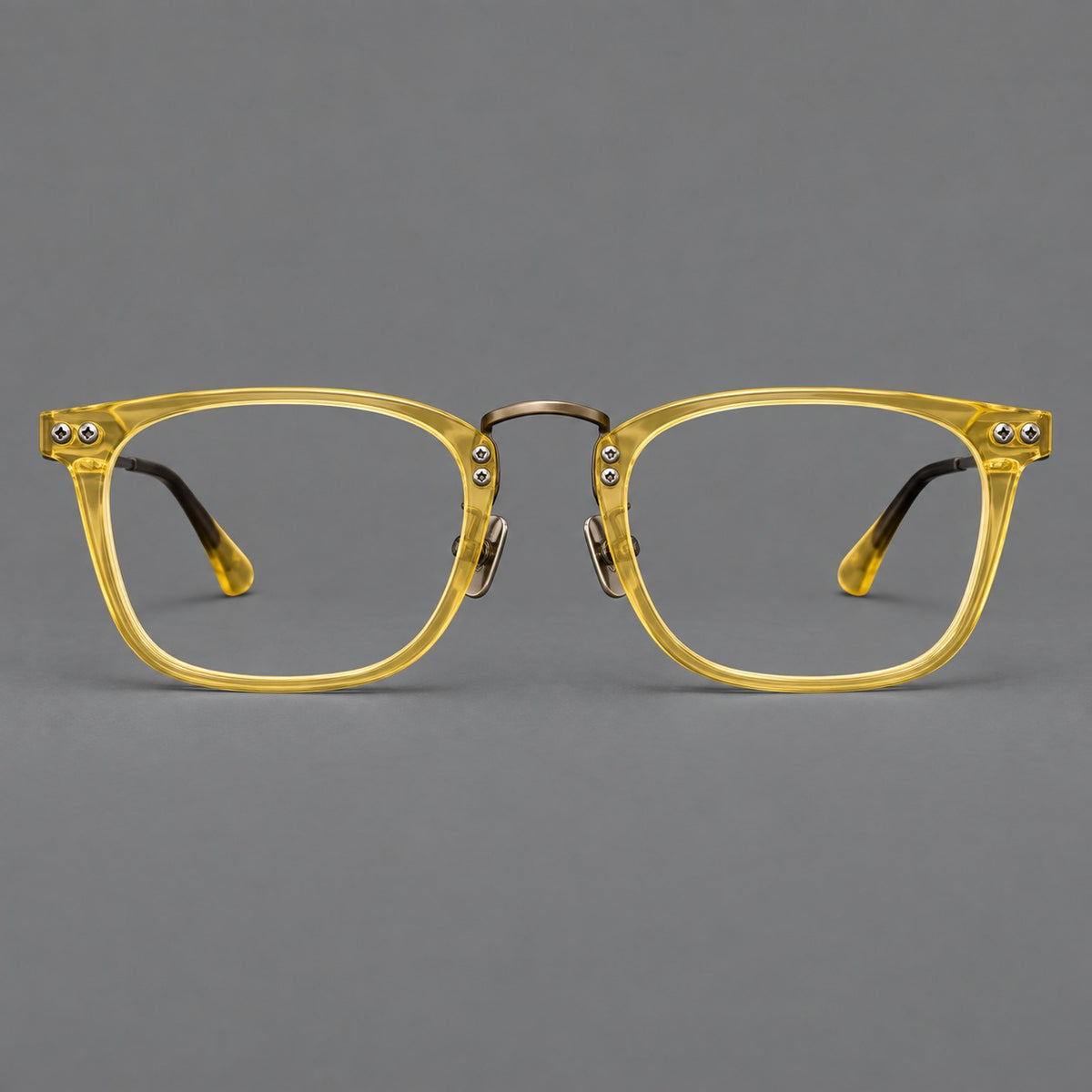 Acetate and titanium eyeglasses with angular rectangular rims and a curved metal bridge — Jade Yellow / Antique Bronze — Front view [CINILY-JD2026-8019-C6]