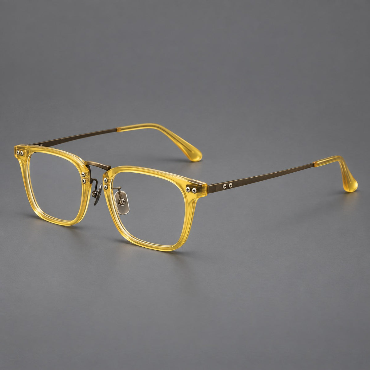Acetate and titanium eyeglasses with angular rectangular rims and a curved metal bridge — Jade Yellow / Antique Bronze — Main view [CINILY-JD2026-8019-C6]