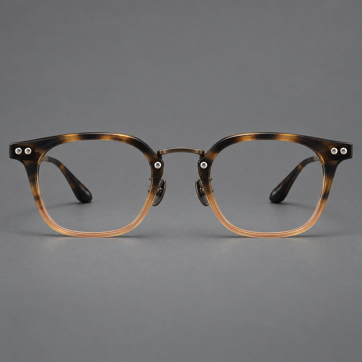 Retro acetate and titanium eyeglasses with softly rounded rims and a metal bridge — Tortoiseshell / Gunmetal — Front view [CINILY-JD2026-8020-C1]