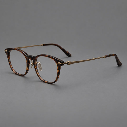 Vintage acetate and titanium eyeglasses with oval rims and decorative metal arrow accents — Tea Woodgrain / Antique Bronze — Main view [CINILY-JD2026-8022-C1]