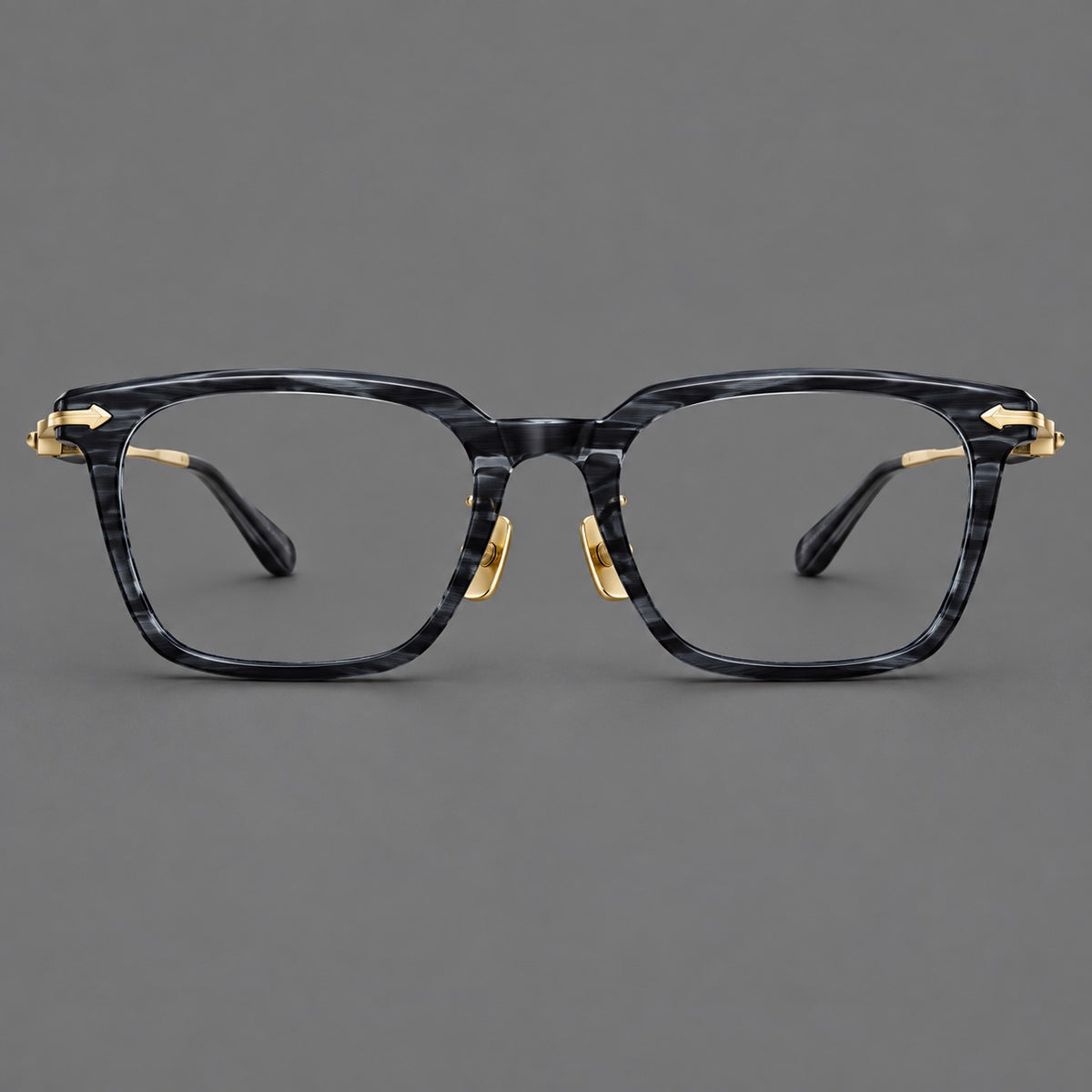 Bold acetate and titanium eyeglasses with rectangular rims and sculpted arrow accents — Grey Blue Woodgrain / Light Gold — Front view [CINILY-JD2026-8023-C1]