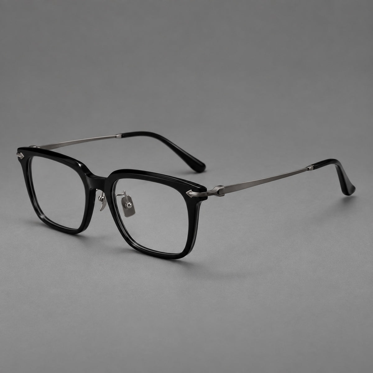 Bold acetate and titanium eyeglasses with rectangular rims and sculpted arrow accents — Black / Gunmetal — Main view [CINILY-JD2026-8023-C3]