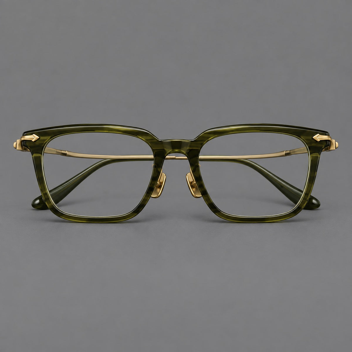 Bold acetate and titanium eyeglasses with rectangular rims and sculpted arrow accents — Army Green / Antique Bronze — Front view [CINILY-JD2026-8023-C5]